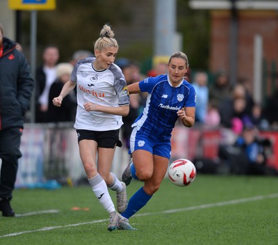 140424 - Cardiff City Women v Swansea City Women - Genero Adran Trophy Final - Emily Thomas of Swansea City Women is challenged by Hannah Power of Cardiff City Women