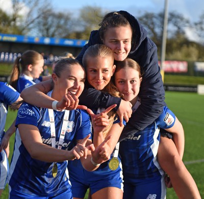 140424 - Cardiff City Women v Swansea City Women - Genero Adran Trophy Final - Cardiff players celebrate at full time with the trophy