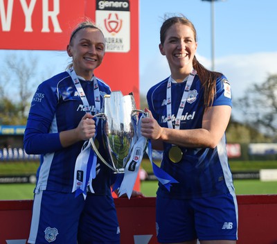 140424 - Cardiff City Women v Swansea City Women - Genero Adran Trophy Final - Cardiff players celebrate at full time with the trophy