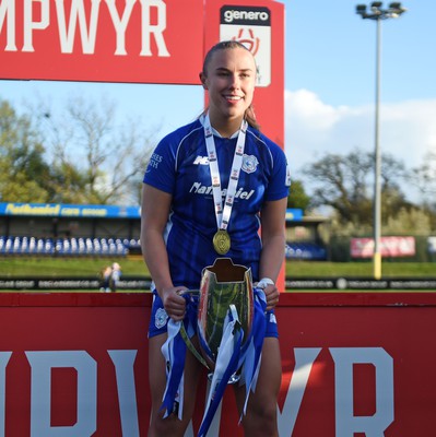 140424 - Cardiff City Women v Swansea City Women - Genero Adran Trophy Final - Seven Watkins of Cardiff City Women celebrates with the trophy