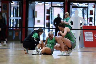 080624 - Cardiff Dragons v Leeds Rhinos - Vitality Netball Super League - Phillipa Yarranton of Cardiff Dragons goes down to receive treatment