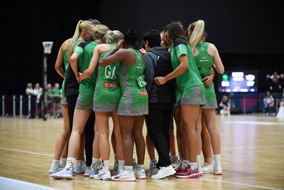 080624 - Cardiff Dragons v Leeds Rhinos - Vitality Netball Super League - Cardiff Dragons huddle before the final quarter