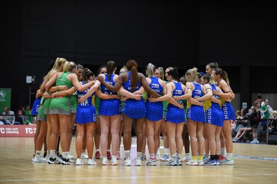 080624 - Cardiff Dragons v Leeds Rhinos - Vitality Netball Super League - both sides huddle at full time