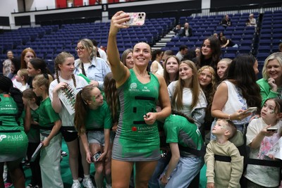 140625 - Cardiff Dragons v London Pulse - Netball Super League - Elle McDonald of Cardiff Dragons with fans