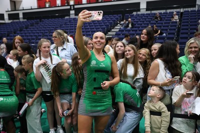 140625 - Cardiff Dragons v London Pulse - Netball Super League - Elle McDonald of Cardiff Dragons with fans