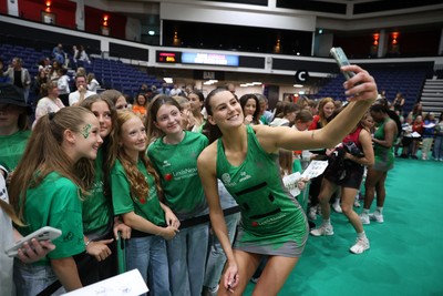 140625 - Cardiff Dragons v London Pulse - Netball Super League - Georgia Rowe of Cardiff Dragons with fans