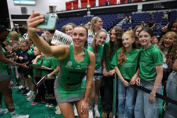 140625 - Cardiff Dragons v London Pulse - Netball Super League - Elle McDonald of Cardiff Dragons with fans
