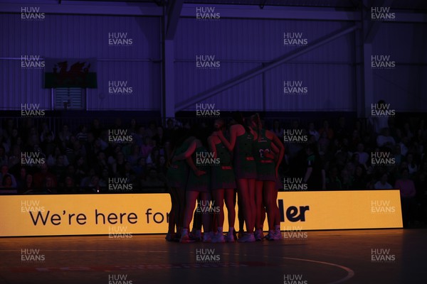 300324 - Cardiff Dragons v London Pulse - Vitality Netball Superleague - Team huddle