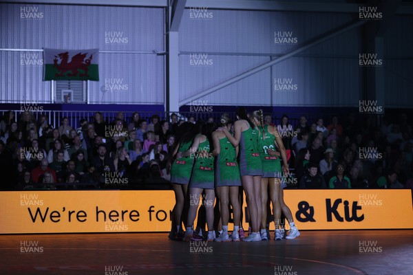 300324 - Cardiff Dragons v London Pulse - Vitality Netball Superleague - Team huddle