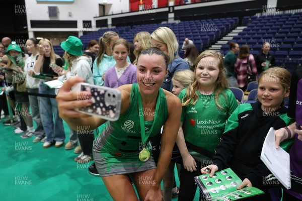 240525 - Cardiff Dragons v Loughborough Lightning - Netball Super League - Elle McDonald of Cardiff Dragons with fans