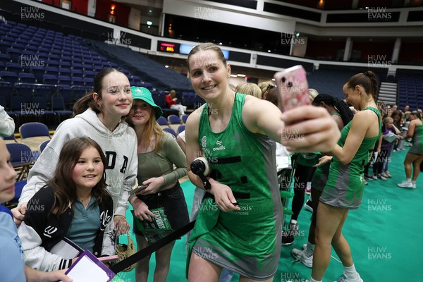 240525 - Cardiff Dragons v Loughborough Lightning - Netball Super League - Chelsea Beard of Cardiff Dragons with fans