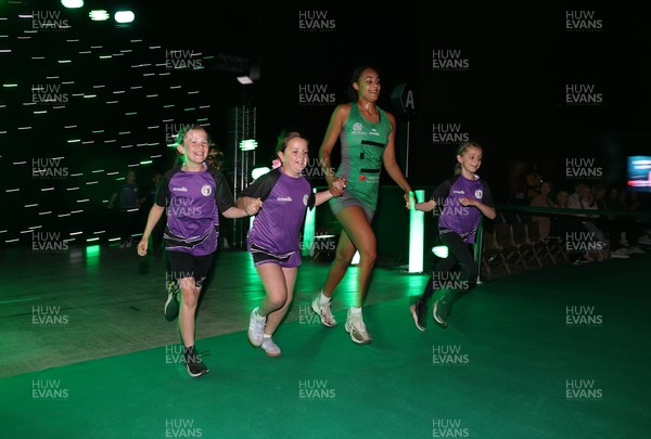 240525 - Cardiff Dragons v Loughborough Lightning - Netball Super League - Celena Appleby-Prince of Cardiff Dragons with mascots