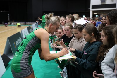 050425 - Cardiff Dragons v Manchester Thunder - Netball Super League - Phillipa Yarranton of Cardiff Dragons with fans