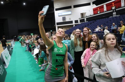 050425 - Cardiff Dragons v Manchester Thunder - Netball Super League - Phillipa Yarranton of Cardiff Dragons with fans