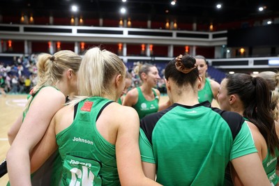 050425 - Cardiff Dragons v Manchester Thunder - Netball Super League - Team huddle