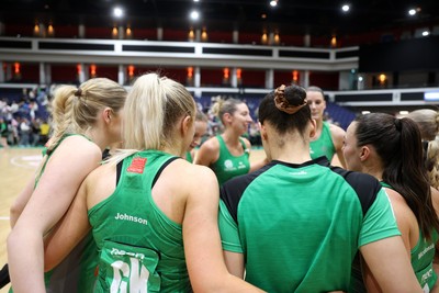 050425 - Cardiff Dragons v Manchester Thunder - Netball Super League - Team huddle