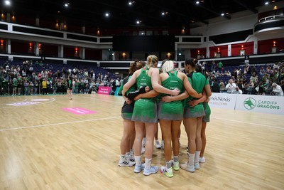 050425 - Cardiff Dragons v Manchester Thunder - Netball Super League - Team huddle