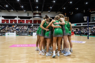 050425 - Cardiff Dragons v Manchester Thunder - Netball Super League - Team huddle