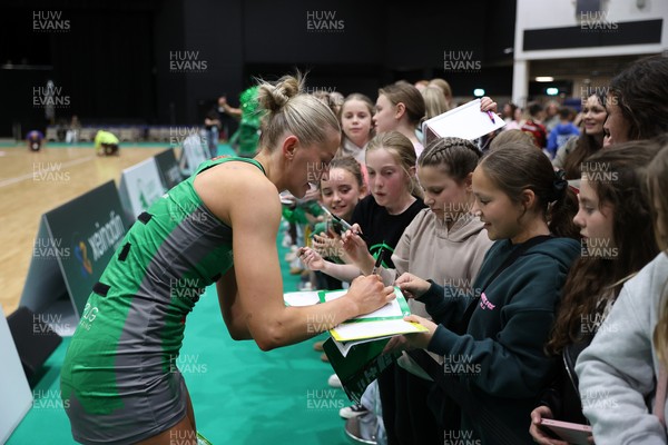 050425 - Cardiff Dragons v Manchester Thunder - Netball Super League - Phillipa Yarranton of Cardiff Dragons with fans