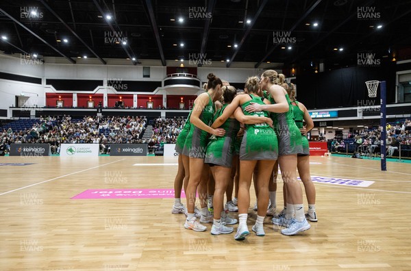 050425 - Cardiff Dragons v Manchester Thunder - Netball Super League - Team huddle