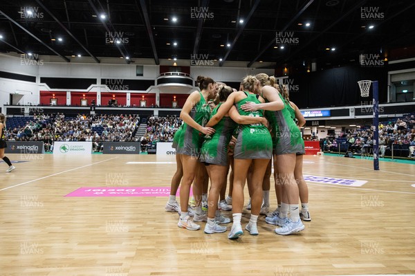 050425 - Cardiff Dragons v Manchester Thunder - Netball Super League - Team huddle