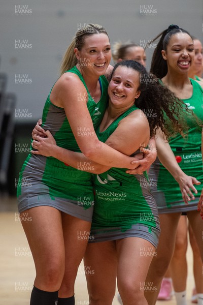 230324 - Cardiff Dragons v Severn Stars - Netball Super League - Leah Middleton and Beth Ecuyer-Dale of Cardiff Dragons celebrate