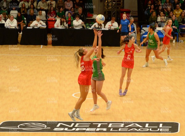 260424 - Cardiff Dragons v Strathclyde Sirens - Vitality Netball Super League - Laura Rudland of Cardiff Dragons is challenged by Mille Sanders of Strathclyde Sirens