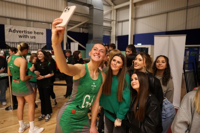 190424 - Cardiff Dragons v Surrey Storms - Vitality Netball Super League - Phillipa Yarranton of Cardiff Dragons with fans 