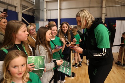 190424 - Cardiff Dragons v Surrey Storms - Vitality Netball Super League - Millie Carter of Cardiff Dragons with fans 