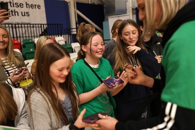 190424 - Cardiff Dragons v Surrey Storms - Vitality Netball Super League - Millie Carter of Cardiff Dragons with fans 