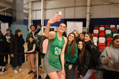 190424 - Cardiff Dragons v Surrey Storms - Vitality Netball Super League - Georgia Rowe of Cardiff Dragons with fans 