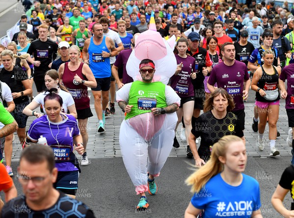 011023 - Principality Building Society Cardiff Half Marathon 2023 - Runner dressed as a unicorn