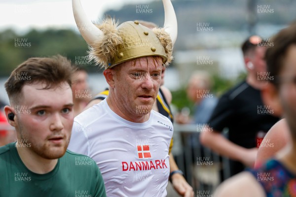 011023 - Principality Building Society Cardiff Half Marathon 2023 - Cardiff Bay - Runner in viking helmet