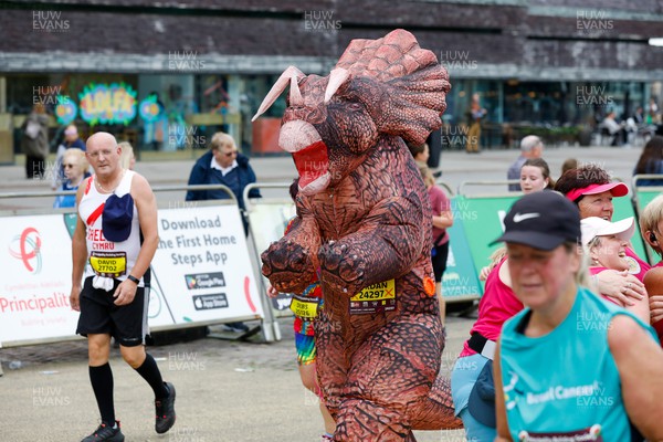 011023 - Principality Building Society Cardiff Half Marathon 2023 - Cardiff Bay - Runner dressed as dinosaur