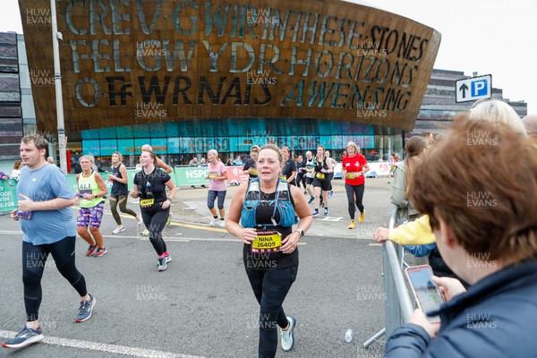 011023 - Principality Building Society Cardiff Half Marathon 2023 - Cardiff Bay - Runners pass Wales Millennium Centre