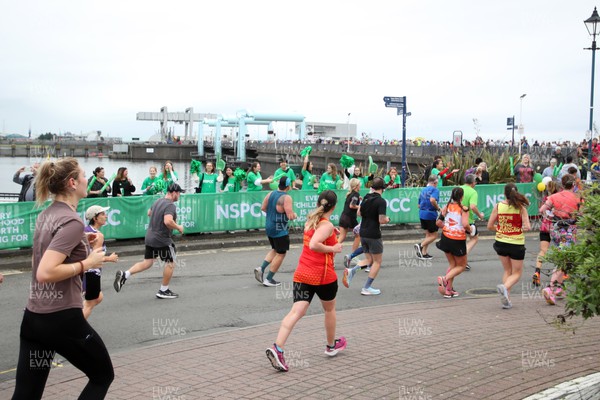 011023 - Principality Building Society Cardiff Half Marathon 2023 -  NSPCC cheer station at the Cardiff Barrage