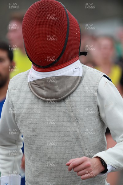 011023 - Principality Building Society Cardiff Half Marathon 2023 - Runner in fencing uniform at the Cardiff Barrage