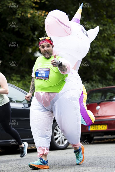 011023 - Principality Building Society Cardiff Half Marathon 2023 - Roath Park and Lake - Runner wearing unicorn costume