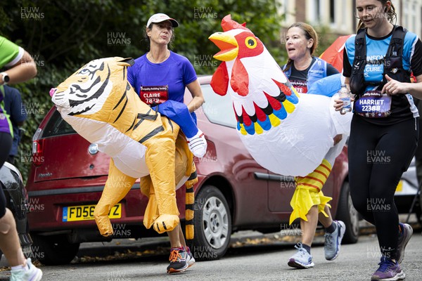 011023 - Principality Building Society Cardiff Half Marathon 2023 - Roath Park and Lake - Runners wearing tiger and chicken costumes