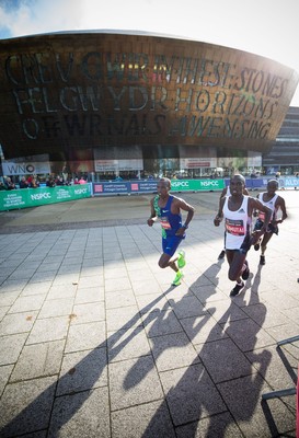 061019 - Cardiff Half Marathon 2019 - The race leaders make their way through Cardiff Bay, Roald Dahl Plas and past the Wales Millennium Centre at the halfway point of the race