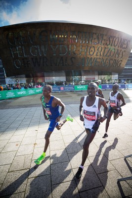 061019 - Cardiff Half Marathon 2019 - The race leaders make their way through Cardiff Bay, Roald Dahl Plas and past the Wales Millennium Centre at the halfway point of the race