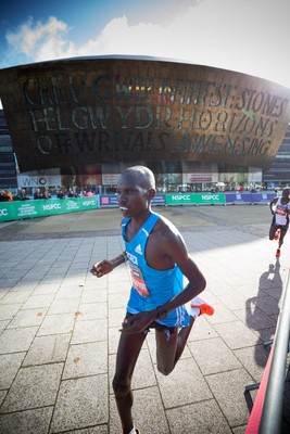 061019 - Cardiff Half Marathon 2019 - The race leaders make their way through Cardiff Bay, Roald Dahl Plas and past the Wales Millennium Centre at the halfway point of the race