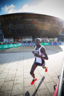 061019 - Cardiff Half Marathon 2019 - The race leaders make their way through Cardiff Bay, Roald Dahl Plas and past the Wales Millennium Centre at the halfway point of the race