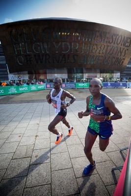 061019 - Cardiff Half Marathon 2019 - The race leaders make their way through Cardiff Bay, Roald Dahl Plas and past the Wales Millennium Centre at the halfway point of the race