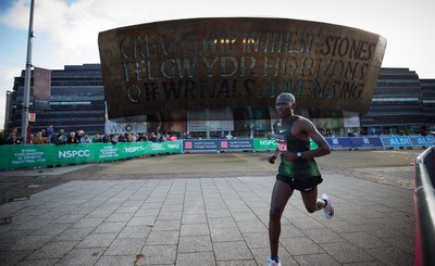 061019 - Cardiff Half Marathon 2019 - The race leaders make their way through Cardiff Bay, Roald Dahl Plas and past the Wales Millennium Centre at the halfway point of the race