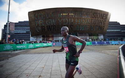 061019 - Cardiff Half Marathon 2019 - The race leaders make their way through Cardiff Bay, Roald Dahl Plas and past the Wales Millennium Centre at the halfway point of the race