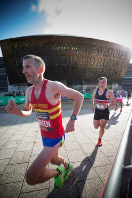 061019 - Cardiff Half Marathon 2019 - Runners make their way through Cardiff Bay, Roald Dahl Plas and past the Wales Millennium Centre at the halfway point of the race