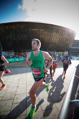 061019 - Cardiff Half Marathon 2019 - Runners make their way through Cardiff Bay, Roald Dahl Plas and past the Wales Millennium Centre at the halfway point of the race