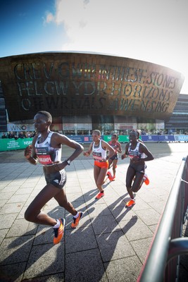 061019 - Cardiff Half Marathon 2019 - Runners make their way through Cardiff Bay, Roald Dahl Plas and past the Wales Millennium Centre at the halfway point of the race