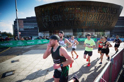 061019 - Cardiff Half Marathon 2019 - Runners make their way through Cardiff Bay, Roald Dahl Plas and past the Wales Millennium Centre at the halfway point of the race